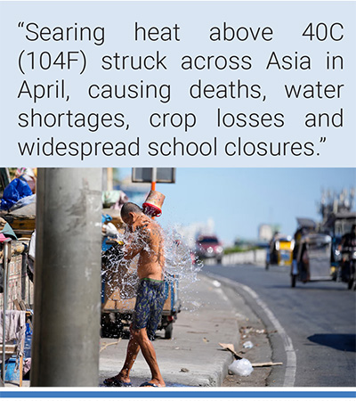 A man tries to cool himself during hot temperatures in Manila, Philippines, in April. Photo: Aaron Favila/AP.