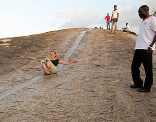 Sliding on the rock in Kotido